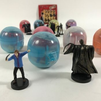 JAJČKA PRESENEČENJA - MIX FIGURIC HARRY POTTER V KAPSULAH (100 kos)