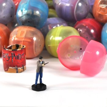 JAJČKA PRESENEČENJA - MIX FIGURIC HARRY POTTER V KAPSULAH (100 kos)